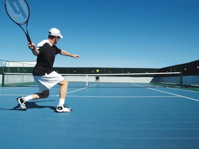 Fantasy tenis hráči analyzující statistiky